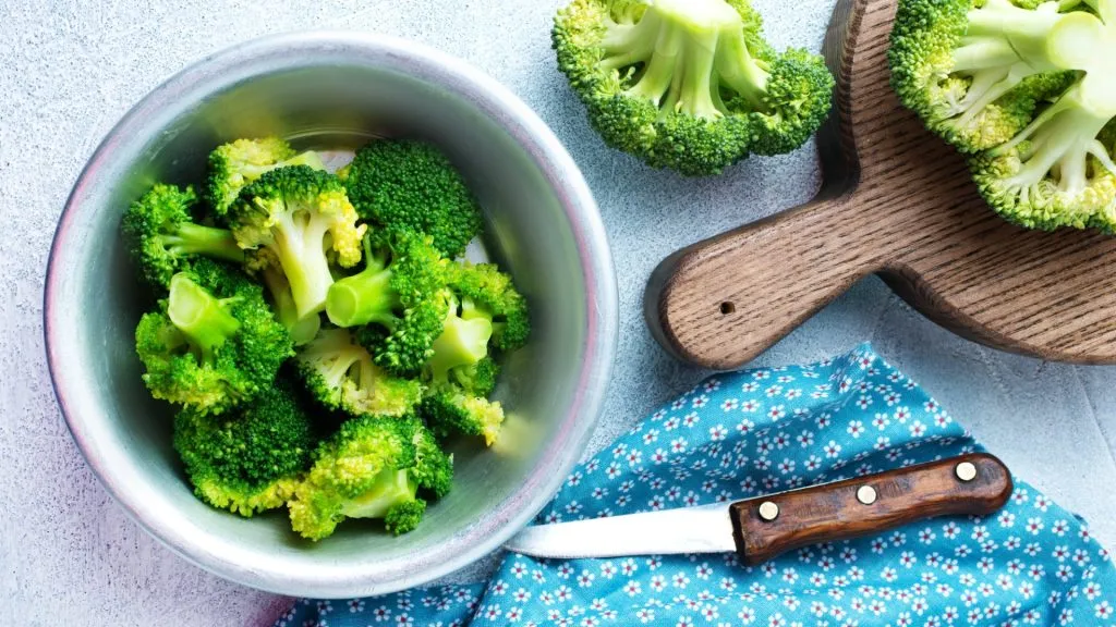 broccoli in white bowl on a table