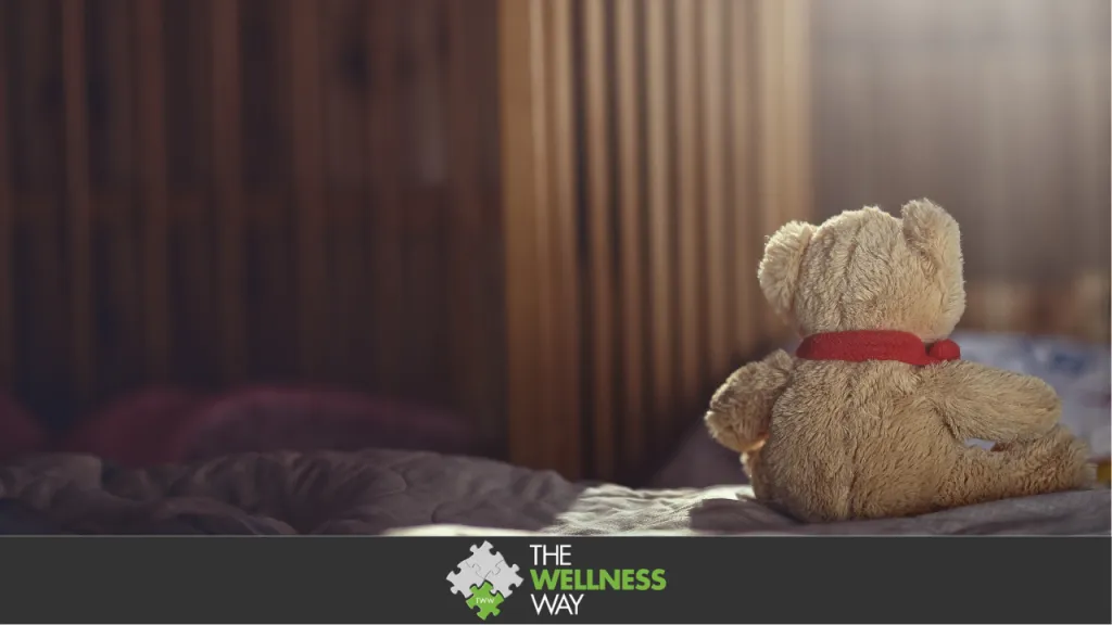 Teddy bear in an empty child's room. Concept of fertility challenges