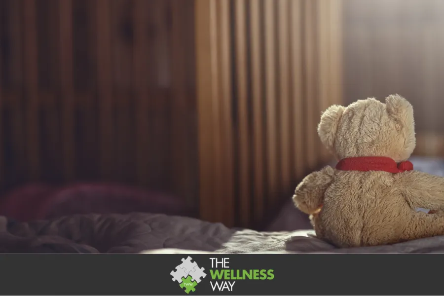 Teddy bear in an empty child's room. Concept of fertility challenges