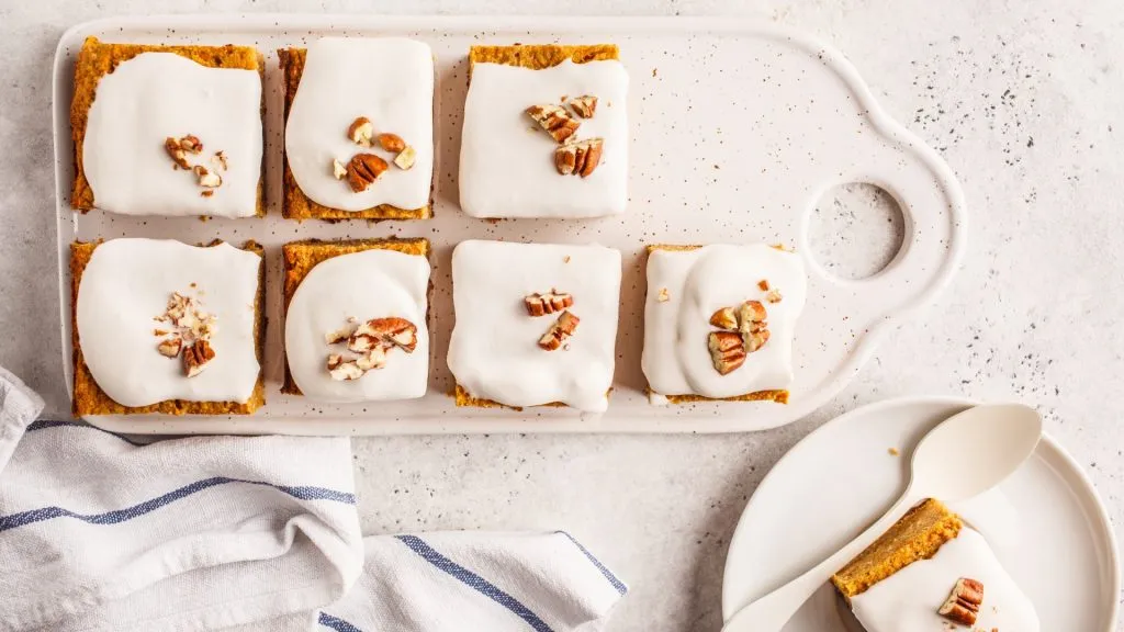 Pumpkin bars cream cheese frosting and pecan nuts
